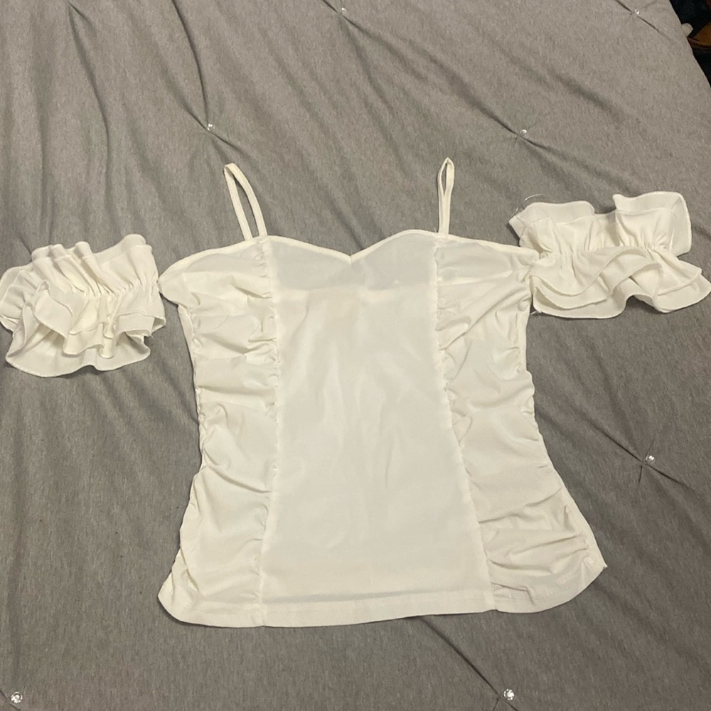 Cute white top with ruffled arm sleeves